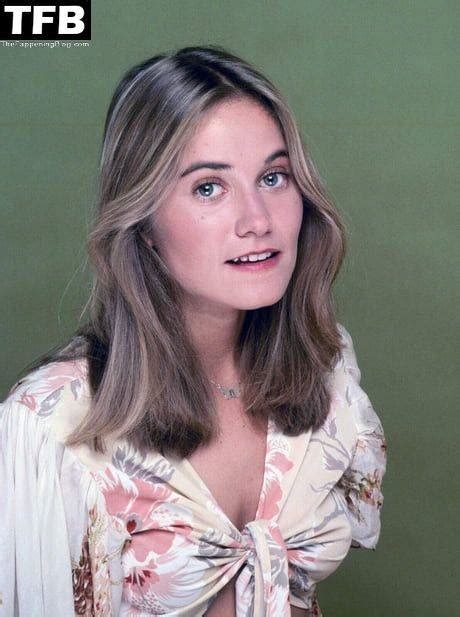A young (One month before her 23rd birthday) Maureen McCormick (Susan Nelson) being very flirty in a 70's shiny red satin tube top (no bra) and matching shor... 